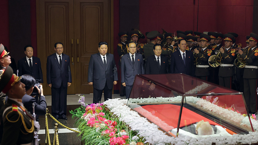 In this photo provided by the government of the Democratic People's Republic of Korea (DPRK), top leader Kim Jong Un (back third left) offers his condolences in front of the coffin of Kim Yong Nam in DPRK, November 4, 2025. /VCG