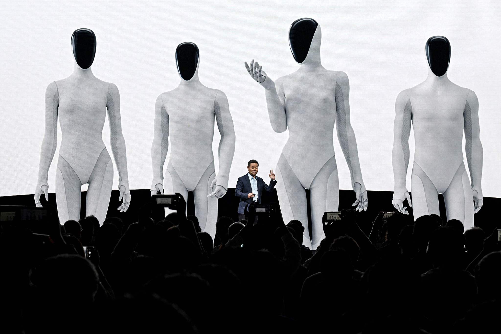 He Xiaopeng, chairman and CEO of XPENG, launches the Next-Gen IRON humanoid robot during XPENG AI Day 2025 held in Guangzhou, south China's Guangdong Province, November 5, 2025. /VCG