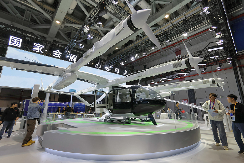A Chinese-made passenger eVTOL is displayed at the 8th China International Import Expo (CIIE) in Shanghai, on November 5, 2025. /VCG
