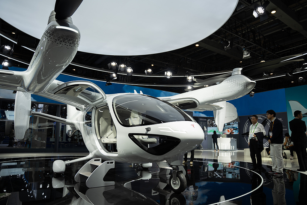 A Chinese-made passenger eVTOL is displayed at the 8th China International Import Expo (CIIE) in Shanghai, on November 5, 2025. /VCG