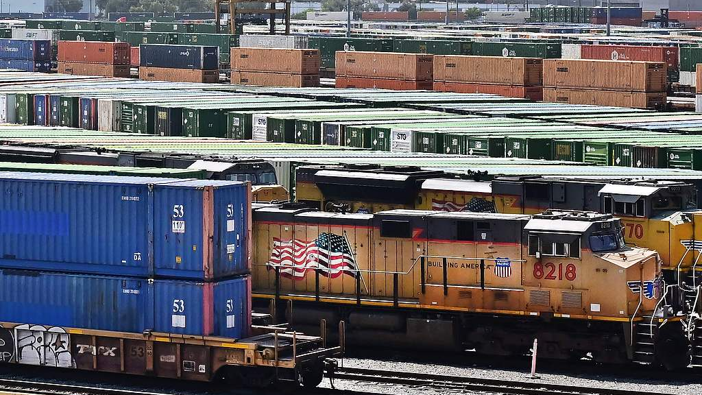 A Union Pacific train passes shipping containers seen at the rail yard at the LATC-Union Pacific Los Angeles Transportation Center in Los Angeles, California, U.S., September 2, 2025. /VCG