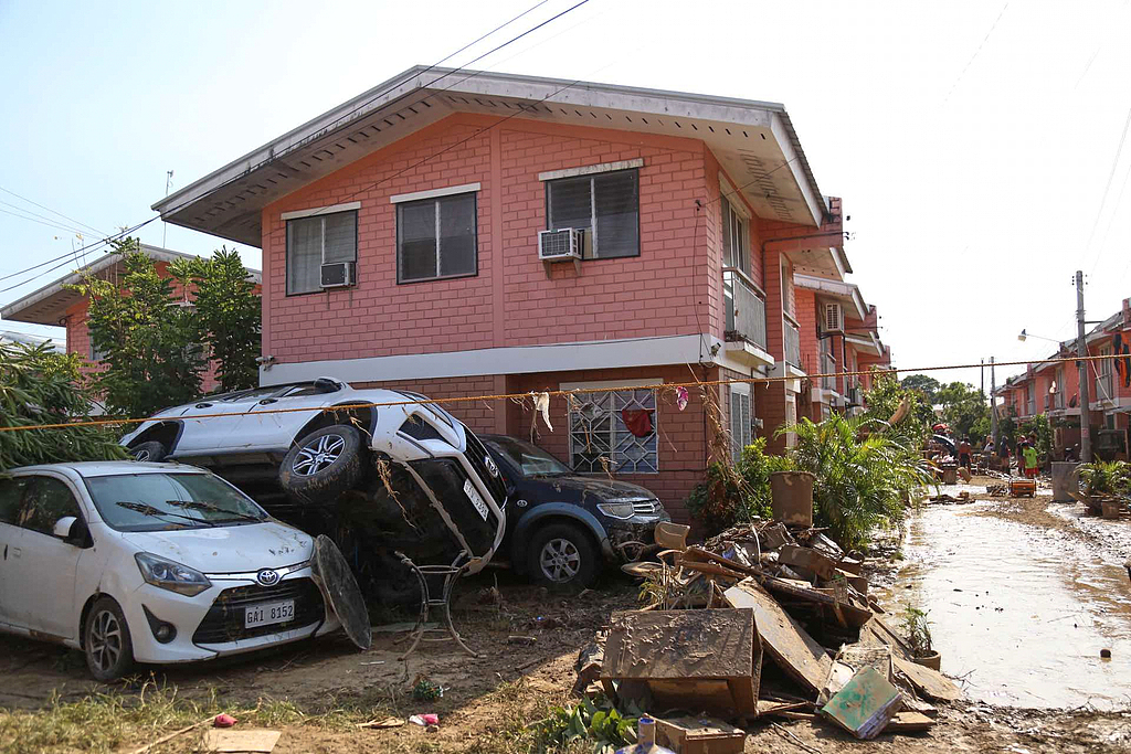 Vehicles stacked on top of each other due to flooding caused by Typhoon Kalmaegi in Cebu province, central Philippines, November 6, 2025. /CFP 