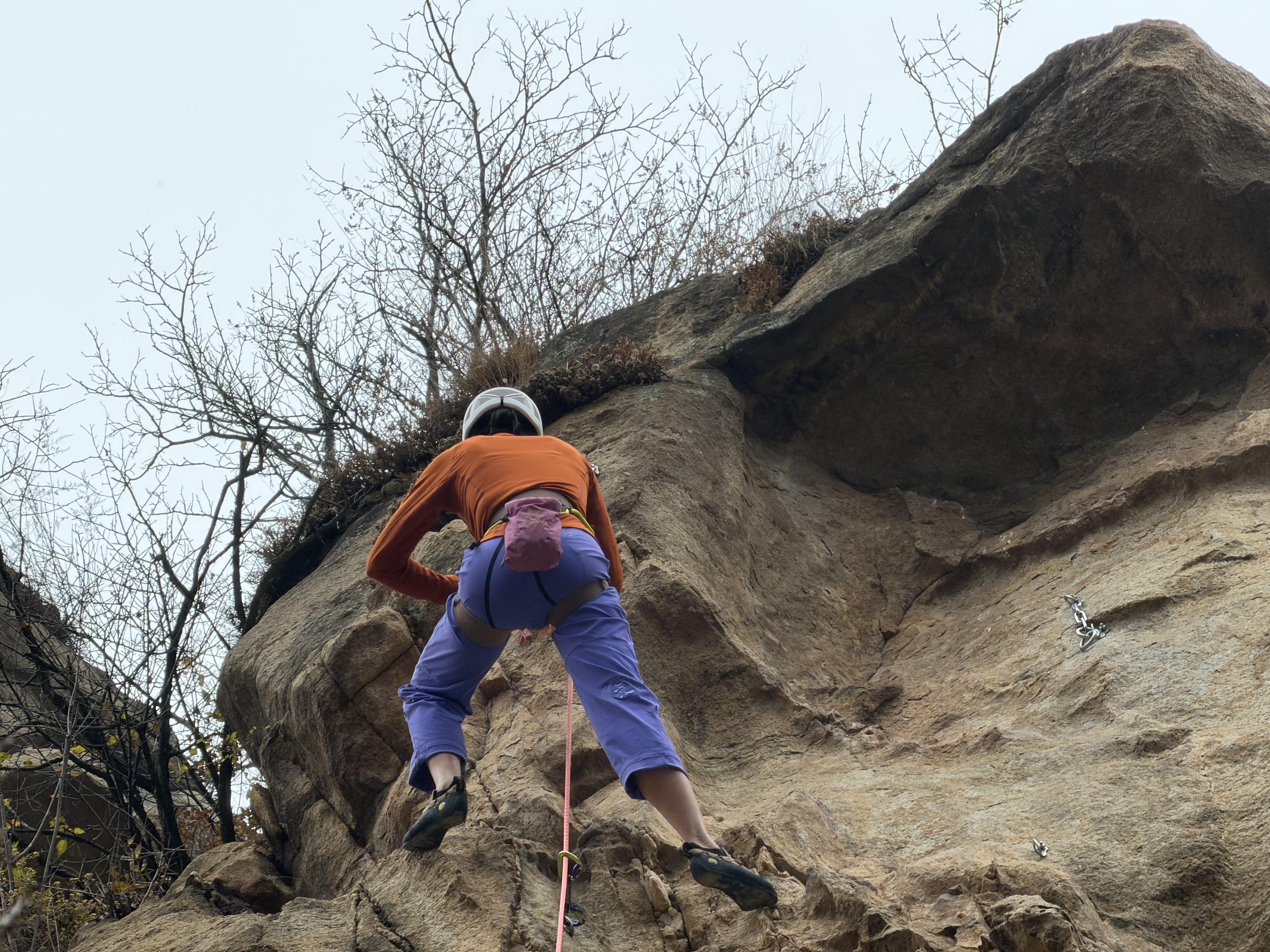 A rock-climbing enthusiast is seen at Jingling Valley in Miyun District, Beijing on November 6, 2025. /CGTN