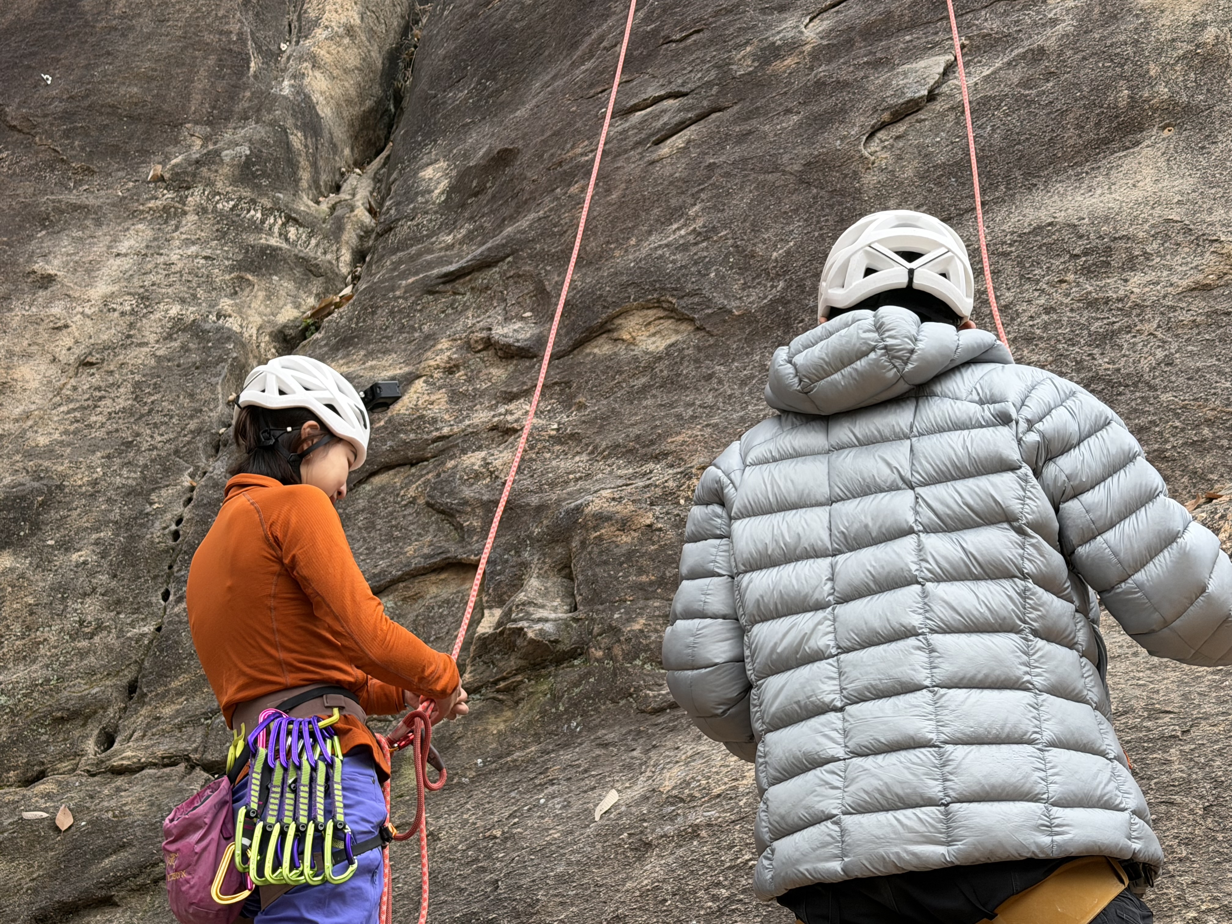Two rock-climbing enthusiasts are pictured at Jingling Valley in Miyun District, Beijing on November 6, 2025. /CGTN