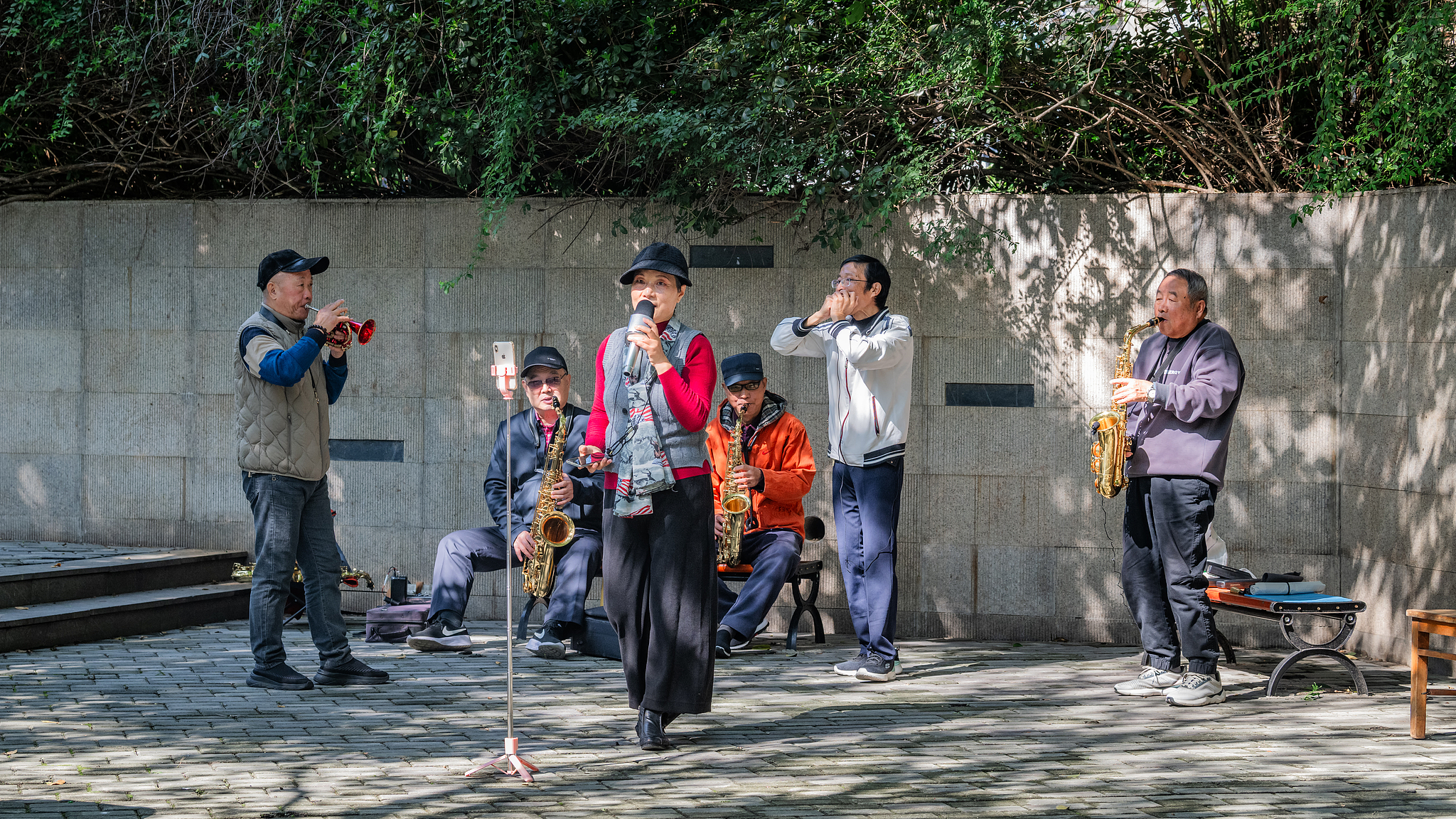 A group of elderly people play musical instruments in Nanjing, east China's Jiangsu Province, October 24, 2025. /VCG