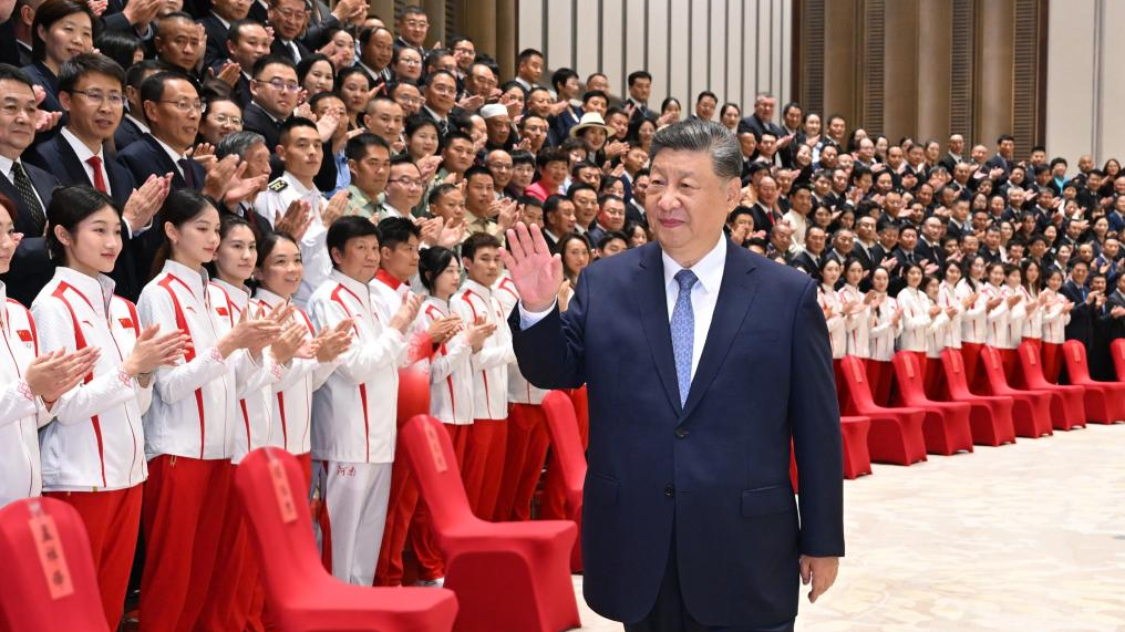 Chinese President Xi Jinping, also general secretary of the Communist Party of China Central Committee and chairman of the Central Military Commission, meets with representatives of national model units and individuals in mass sports and competitive sports in Guangzhou, capital of south China's Guangdong Province, November 9, 2025. /Xinhua