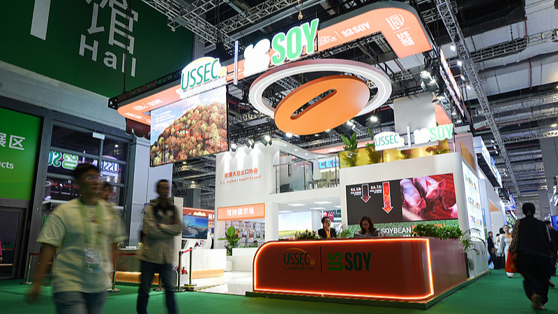 Visitors tour the U.S. Soybean Export Council booth at the 8th China International Import Expo in Shanghai, China, November 8, 2025. /VCG