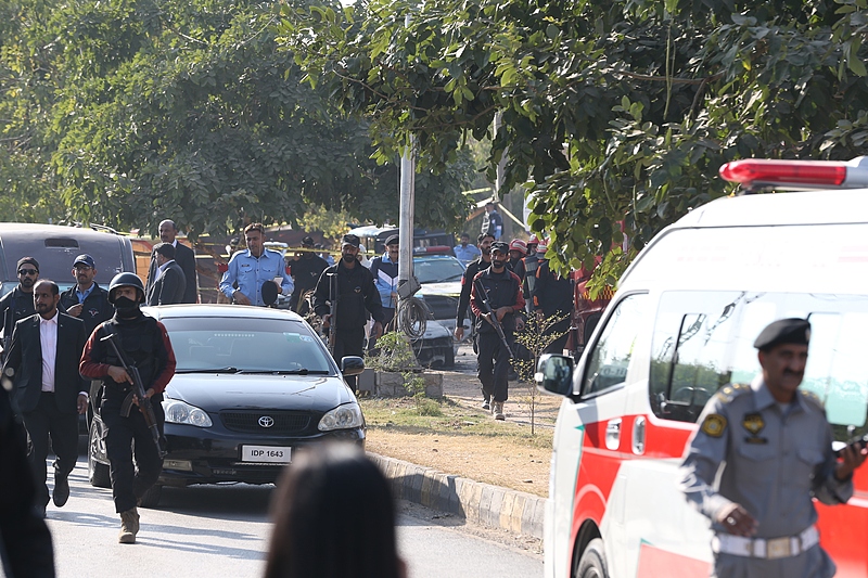 Security forces are seen at the site where at least 12 people were killed and several others injured in an explosion outside a court complex in Pakistan's capital, Islamabad, November 11, 2025. /VCG