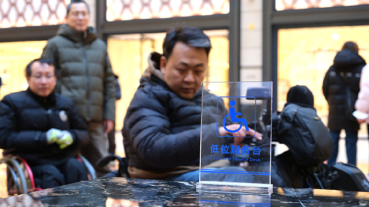 Peng Liyuan, Queen Letizia of Spain visit disability service center