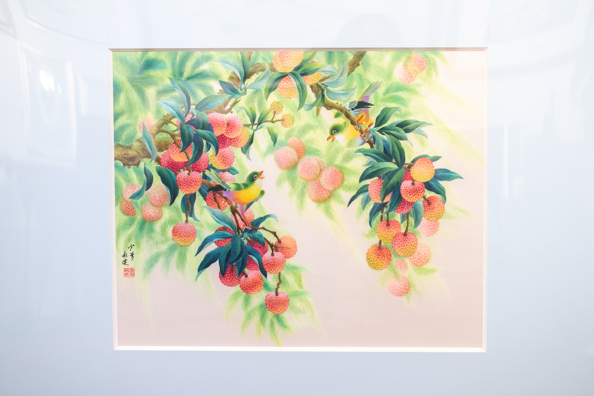 A file photo shows a lychee embroidery work in Tan Zhanpeng's studio in Guangzhou, Guangdong Province. /VCG