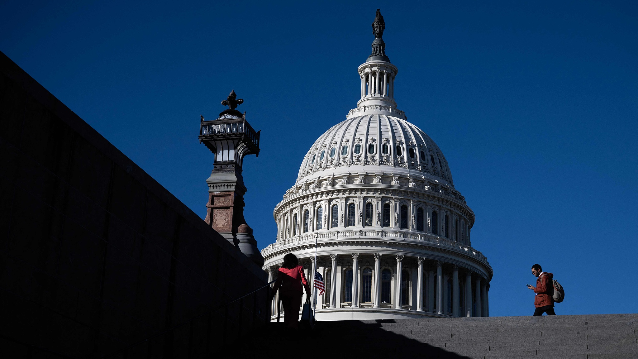 People walking past the Capitol in Washington, DC, November 13, 2025. /VCG