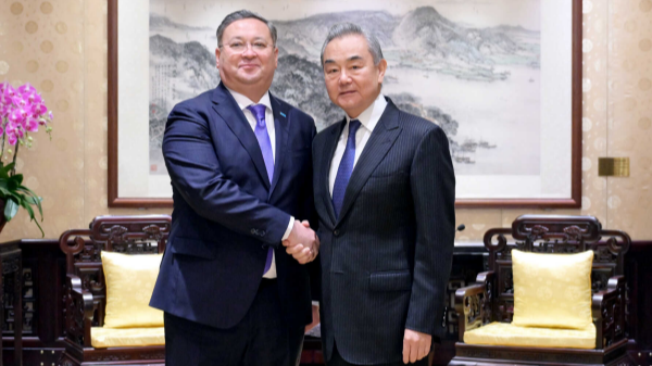 Wang Yi meets Kazakhstan's presidential assistant Nurtleu in Beijing