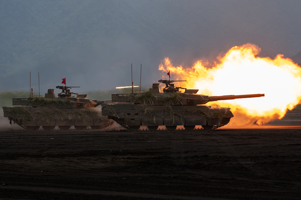 A Japan Ground Self-Defense Force (JGSDF) battle tank fires ammunition during a live-fire exercise at the East Fuji Maneuver Area in Gotemba, Shizuoka Prefecture, Japan, June 8, 2025. /VCG