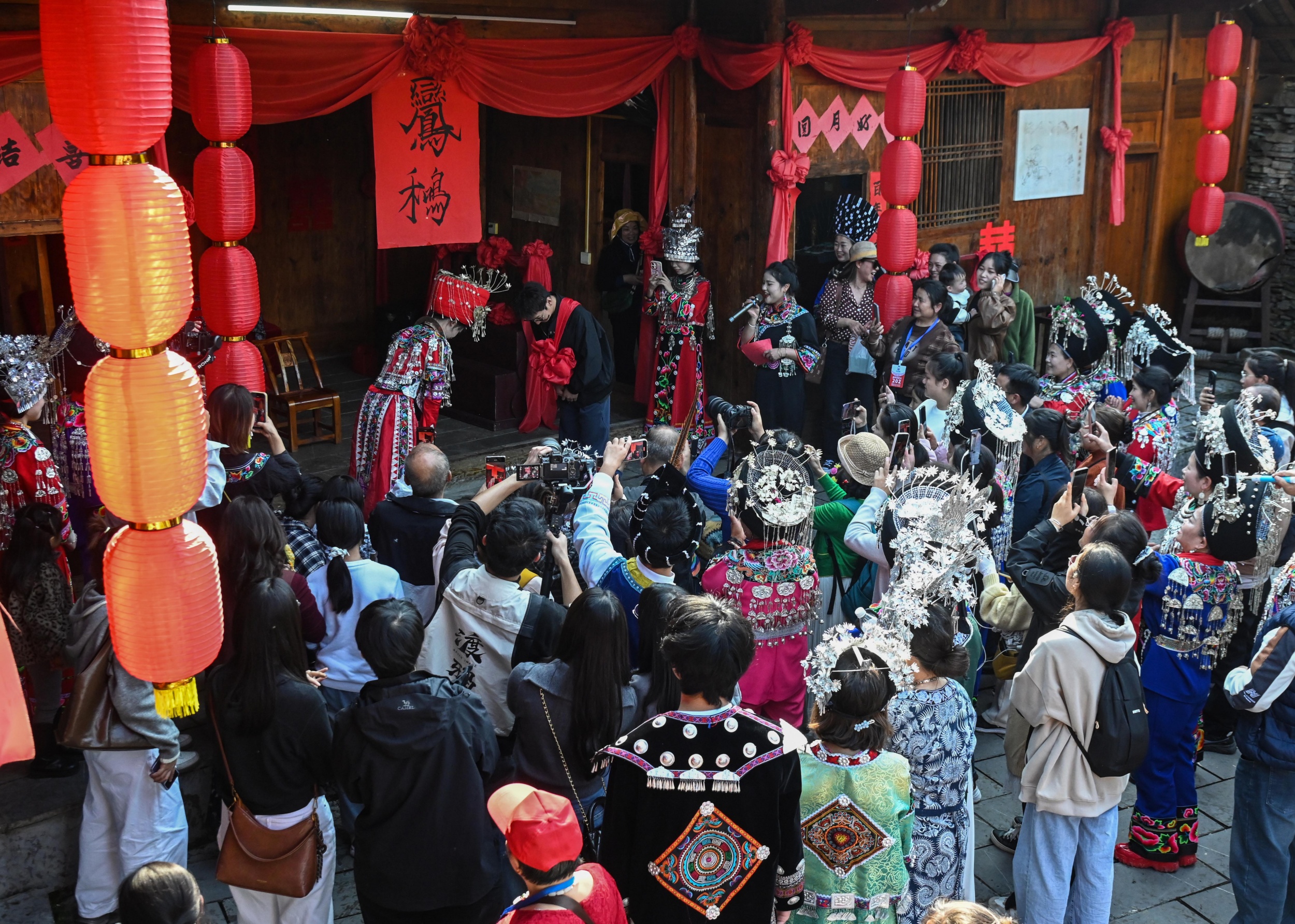 People celebrate Miao New Year at Miaowangcheng (Ancient Miao Castle) Scenic Area in Songtao Miao Autonomous County, Tongren City, southwest China's Guizhou Province on November 15, 2025. /Tongren Media Convergence Center