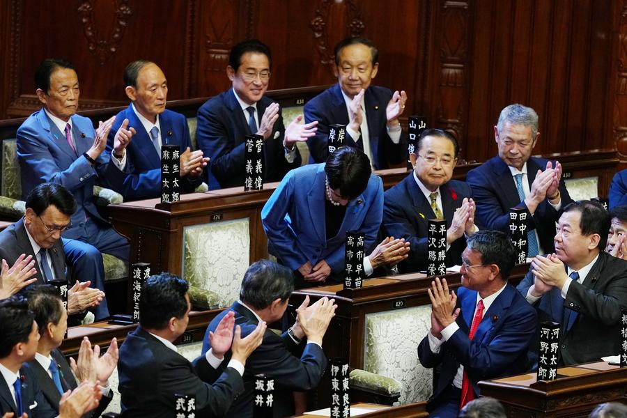 Sanae Takaichi bows after winning the prime ministerial vote in the House of Representatives in Tokyo, Japan, October 21, 2025. /Xinhua