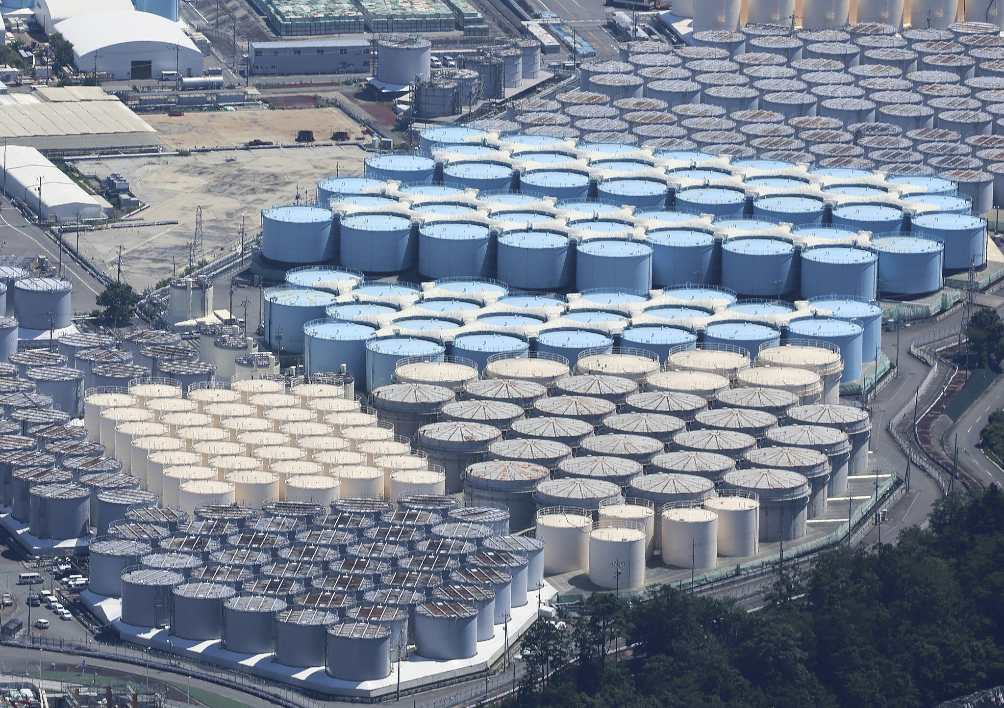 An aerial photo shows tanks of treated water at the Fukushima Daiichi nuclear power plant in Fukushima Prefecture, Japan, on August 19, 2025. /VCG