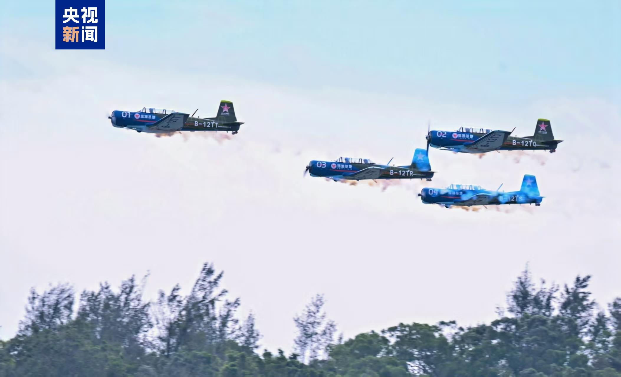 Several planes soar in the air, Zhuhai, China. /CMG