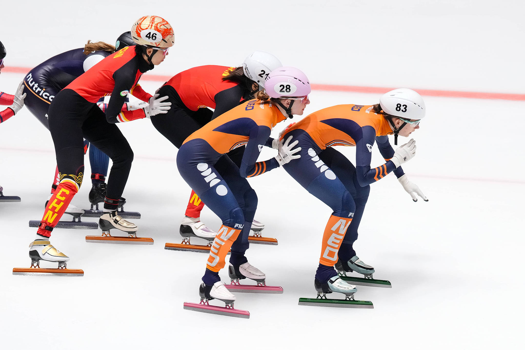 Athletes of China (red) and the Netherlands (orange) compete in the women's 3,000-meter relay event at the International Skating Union (ISU) Short Track Speed Skating World Tour in the Netherlands, November 27, 2025. /VCG