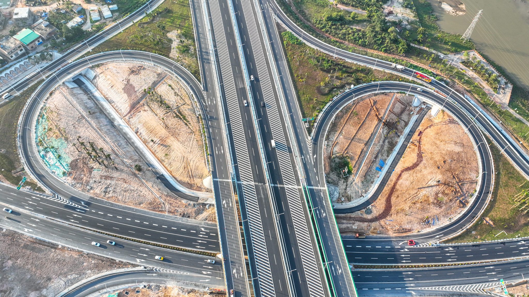 An aerial view of the newly upgraded section of the G98 Hainan Island Ring Expressway is seen in Ding'an Counnty, Hainan Province on November 25, 2025. /VCG