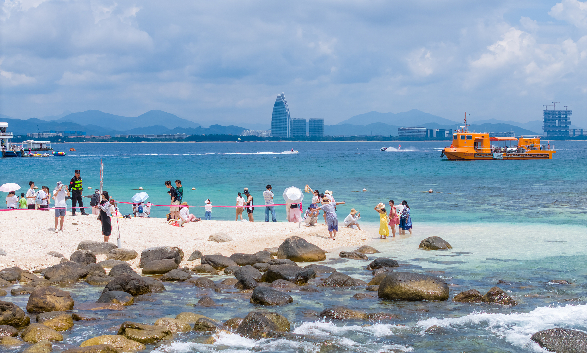 Tourists enjoy the seaside in South China's Hainan Province, August 9, 2025. /VCG