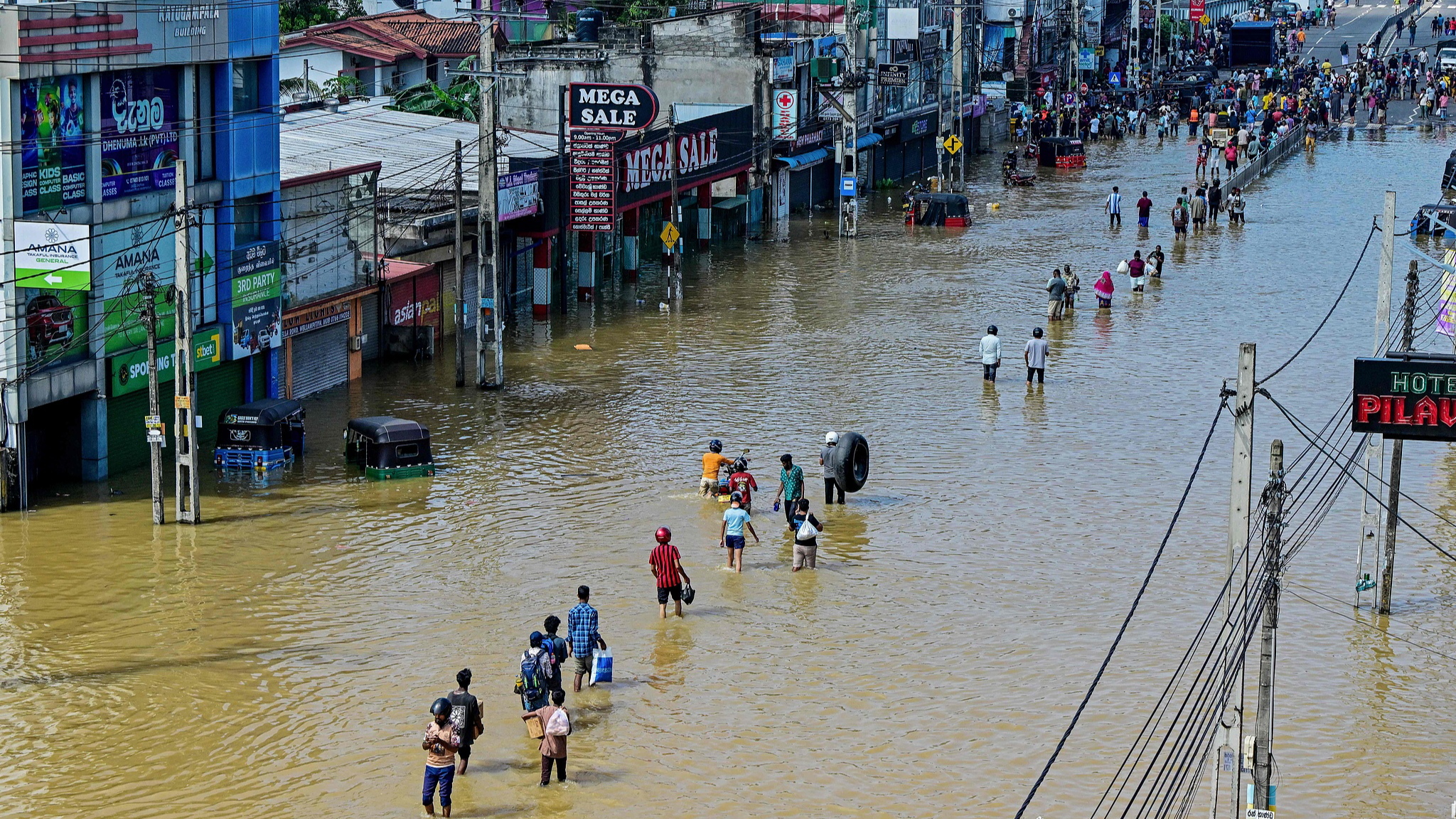 Storms batter South and Southeast Asia, leaving over 1,100 dead