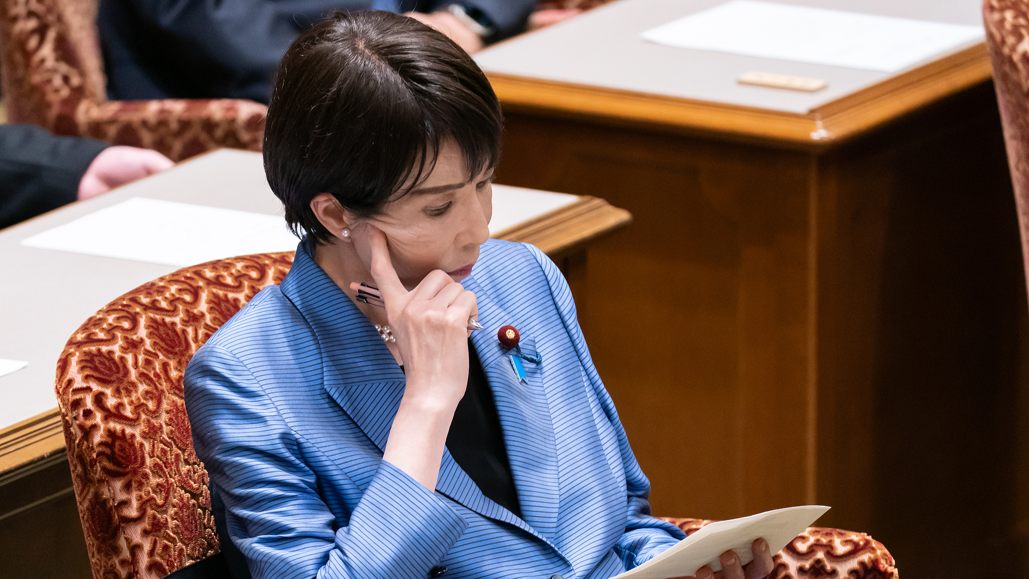 Japanese Prime Minister Sanae Takaichi participating in a party leader debate in the House of Councillors of the National Diet, Japan, November 26, 2025. /VCG