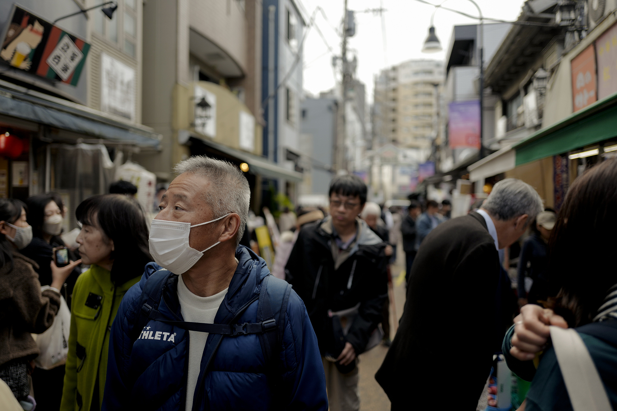 People walk in Yanaka Ginza in Tokyo, Japan, November 29, 2025. /VCG