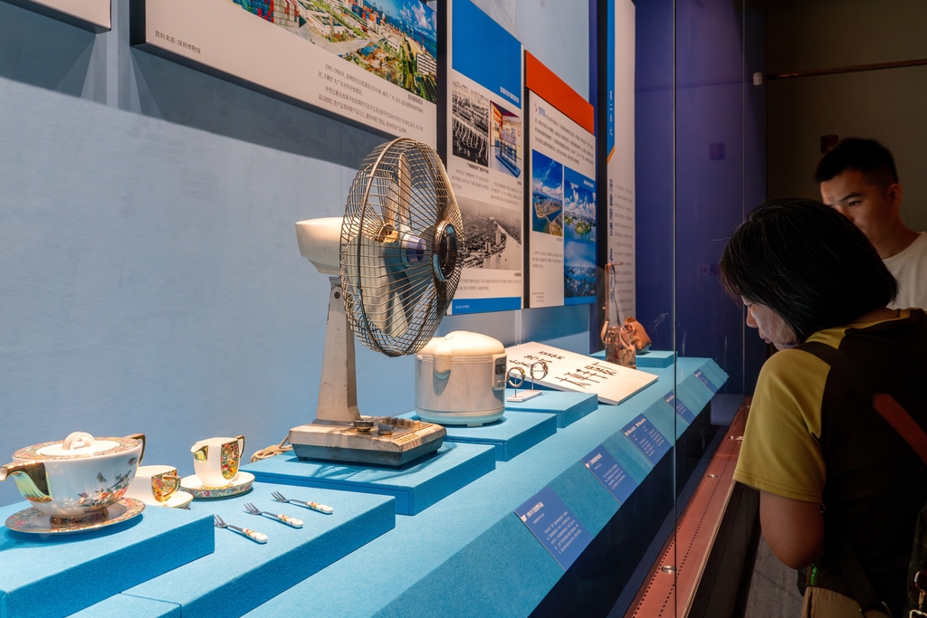 Daily utensils from the 20th century are displayed at the 