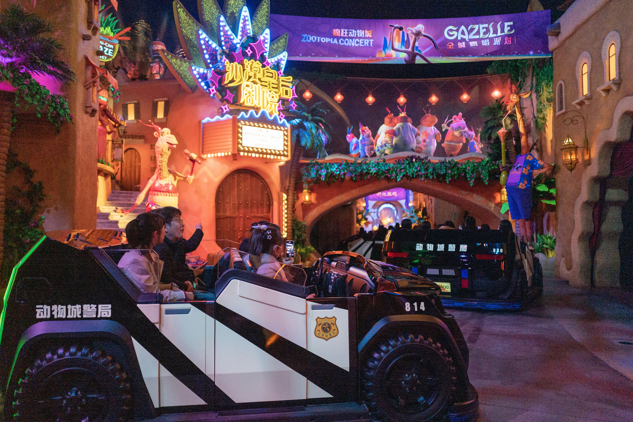 Visitors line up for Zootopia: Hot Pursuit, a thrilling coaster ride enhanced with dynamic lighting and mist effects at the Zootopia-themed area of Shanghai Disney Resort on November 28, 2025. /VCG