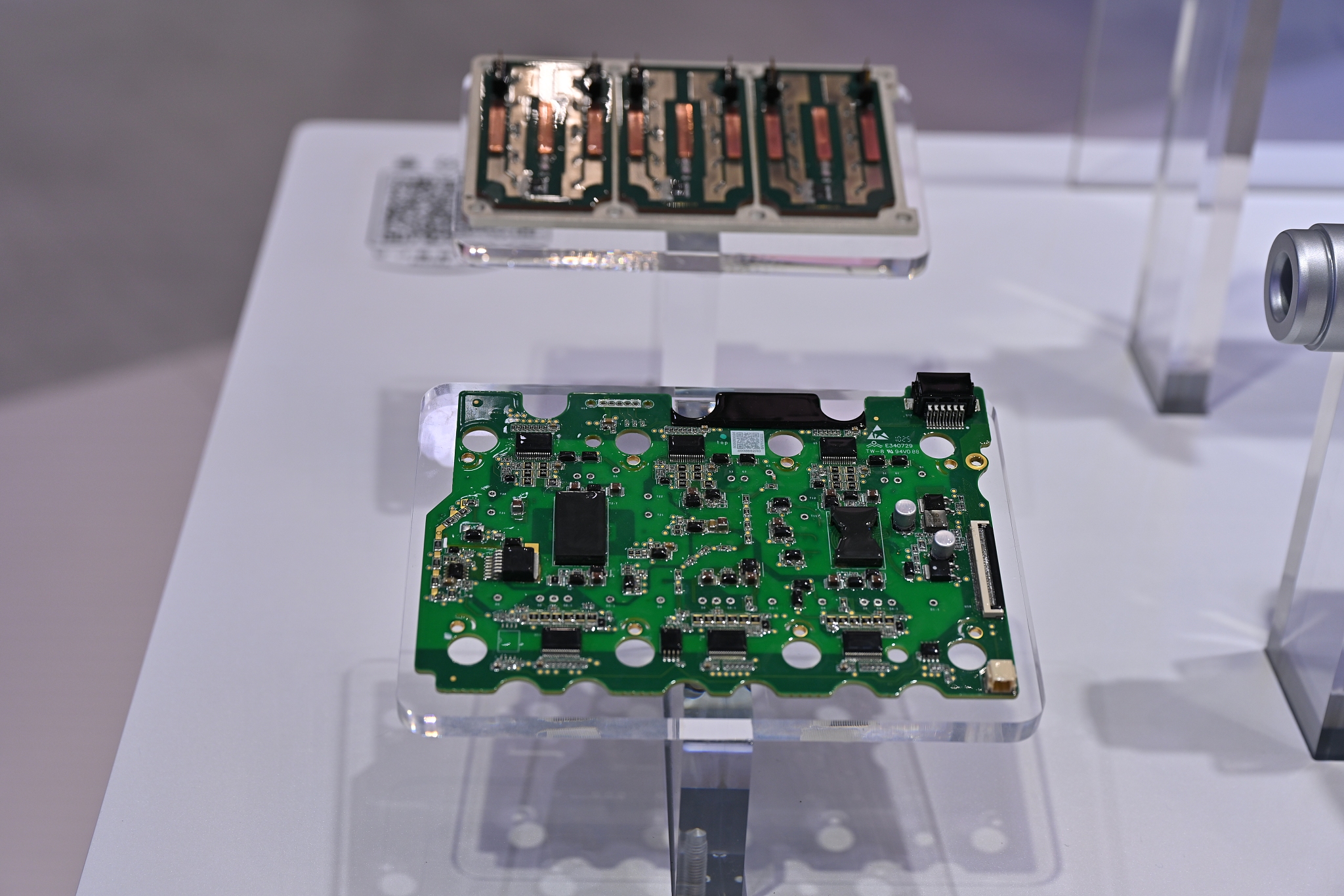 At the 23rd Guangzhou International Auto Show 2025, GAC Group showcases embedded silicon carbide chip power modules in Guangdong Province, Nov. 27, 2025. /VCG