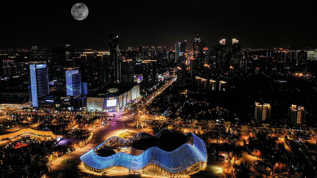 A supermoon over the skies of Huqiu District in Suzhou, Jiangsu Province, China, beautifully aligning with the city's iconic landmarks, December 4, 2025. /VCG