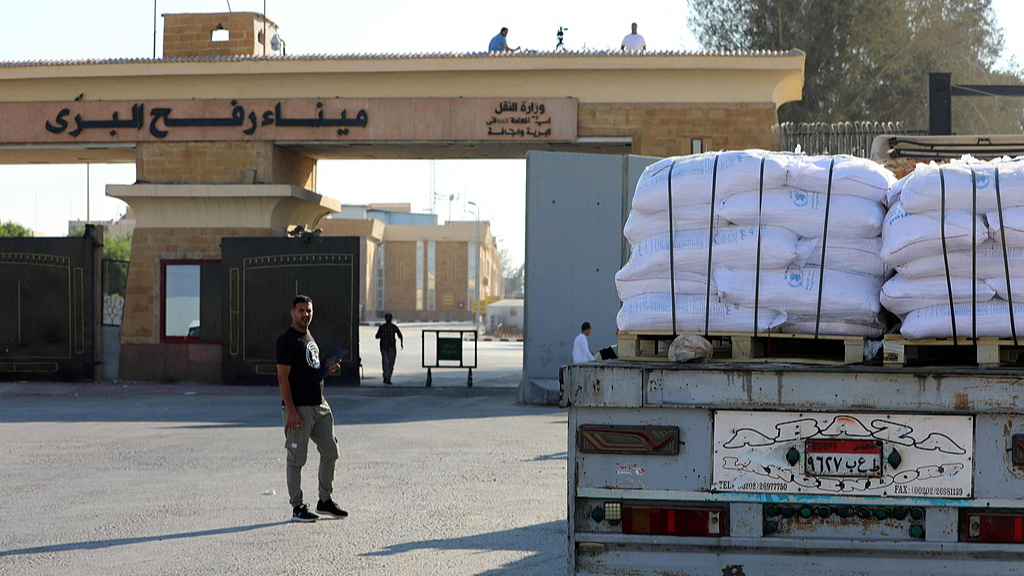 A truck loaded with humanitarian aid awaits permission on the Egyptian side of the Rafah crossing with the Gaza Strip, to drive toward the besieged Palestinians territory, July 27, 2025. /VCG