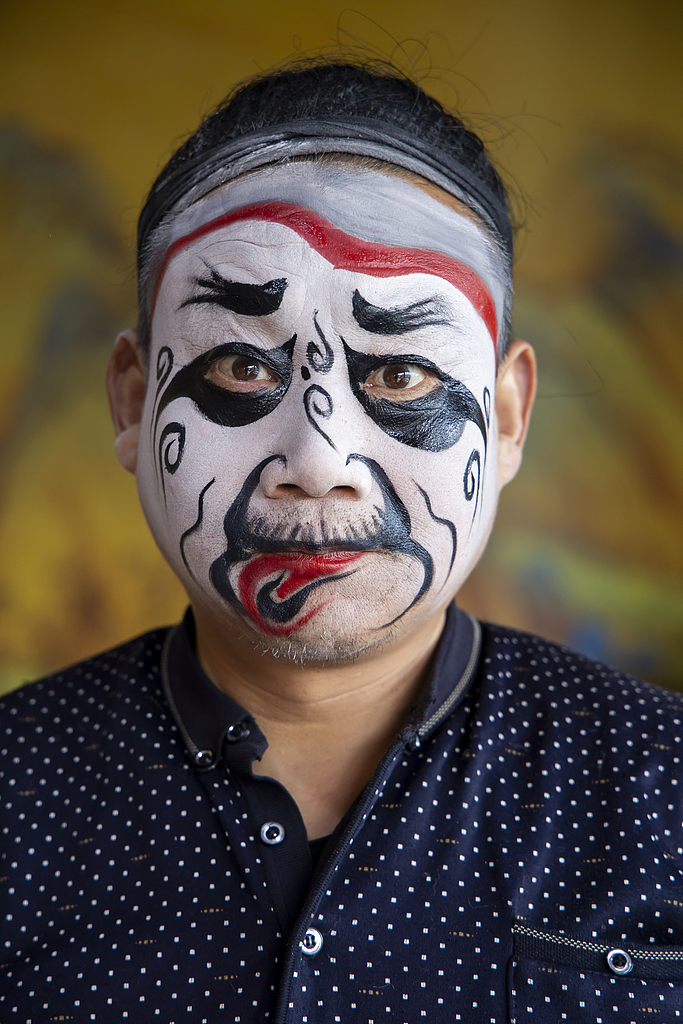 Chou is one of the main character tropes in Chinese opera, usually portraying a clown-like or comic role. /VCG