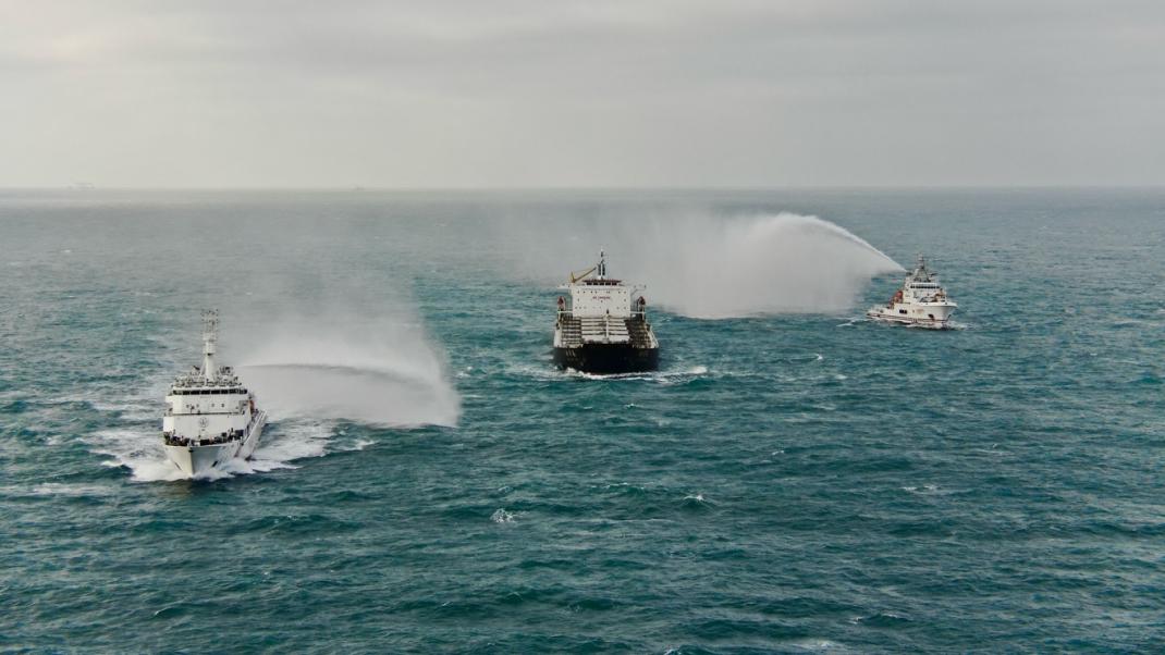 Rescue vessels carry out a fire extinguishing drill on a merchant ship in the Taiwan Shoal, Taiwan, China, December 6, 2025. /Xinhua