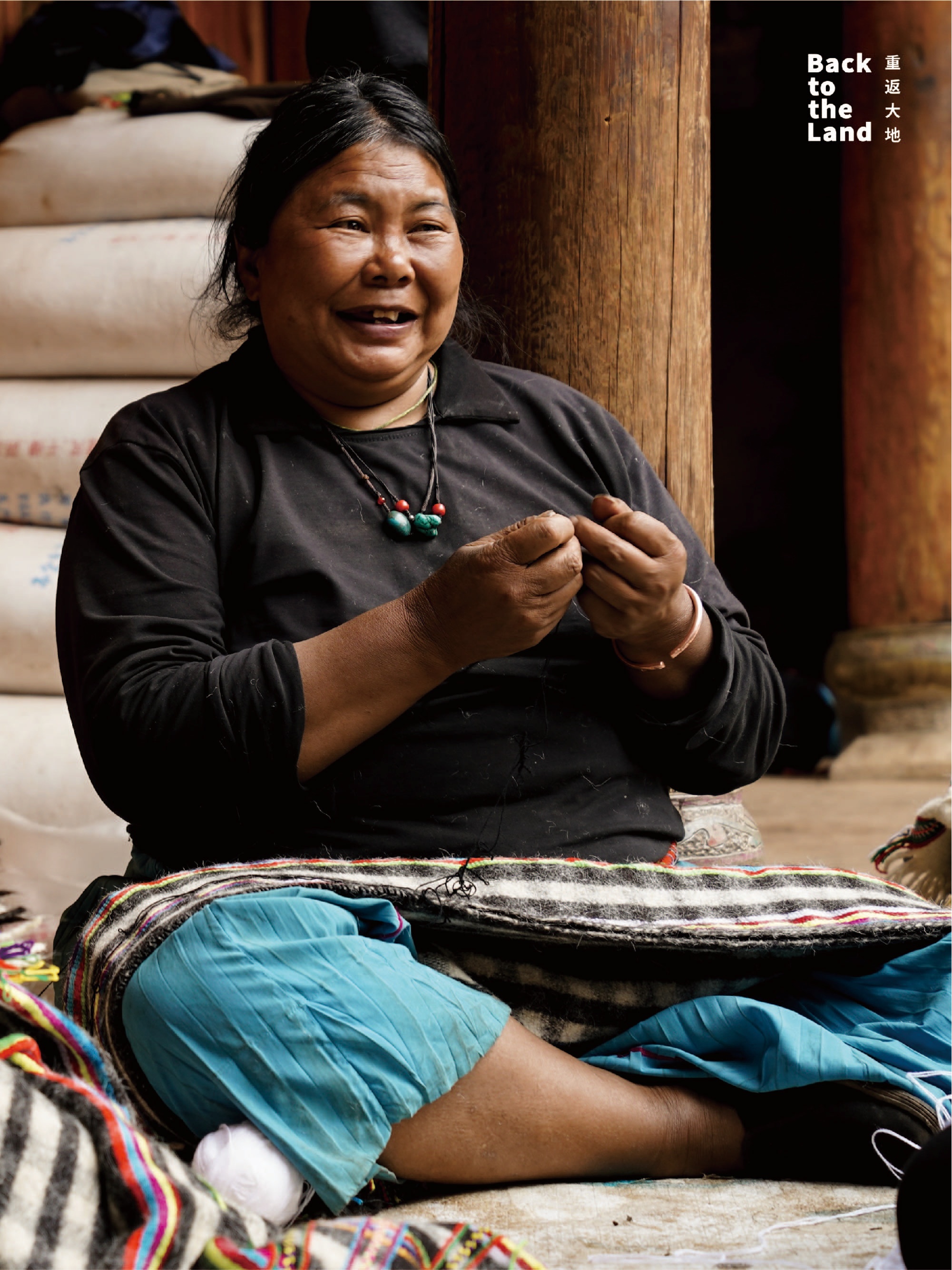 A Mosuo woman weaves wool by hand, preserving a matrilineal craft rooted in everyday life in Lijiang, Yunnan Province. /CGTN