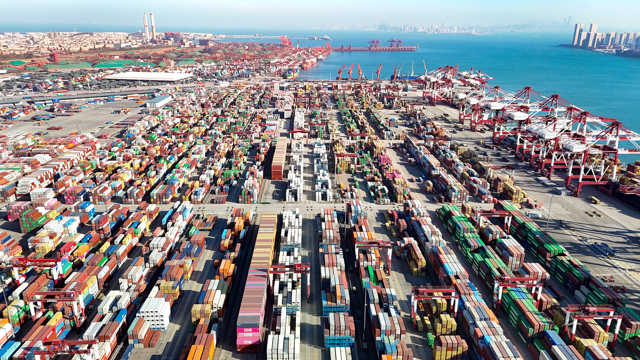 A busy scene at the container yard of Qingdao Port in Shandong Province, China, December 8, 2025. /VCG