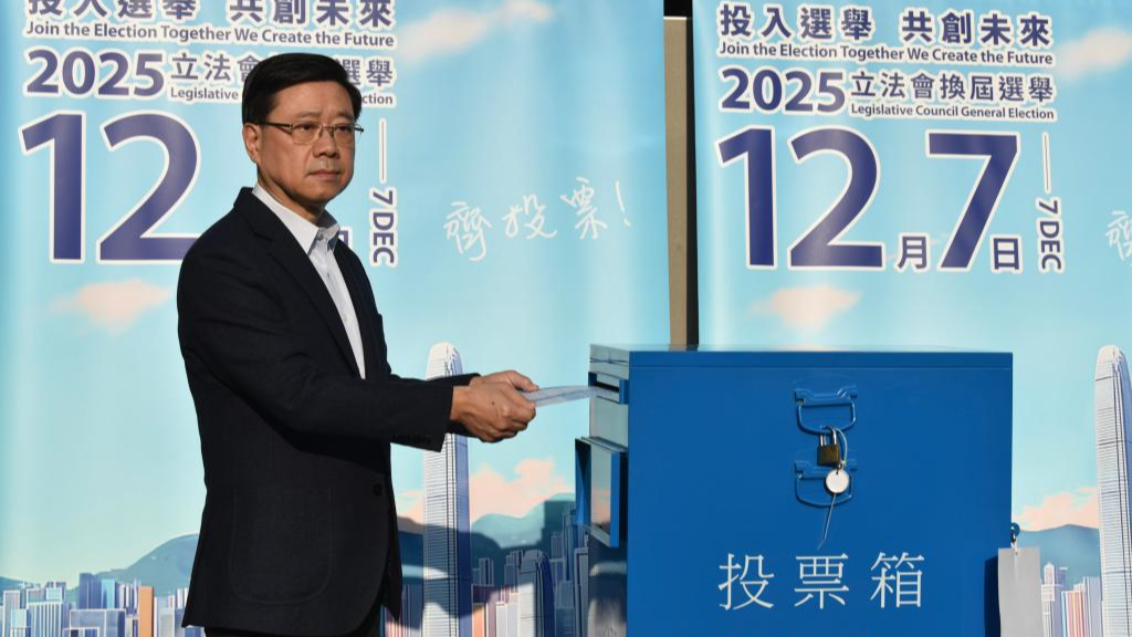 Hong Kong Special Administrative Region (HKSAR) Chief Executive John Lee Ka-chiu casts his ballot at a polling station in Hong Kong, south China, December 7, 2025. /Xinhua