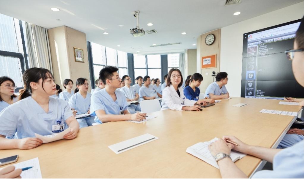 Specialists from various disciplines discuss a complex case.