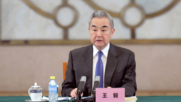 Chinese Foreign Minister Wang Yi speaks at a symposium on the study and research of Xi Jinping Thought on Diplomacy, Beijing, China, December 9, 2025. /Chinese Foreign Ministry 