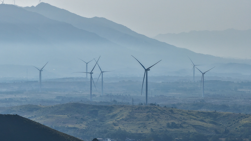 Wind turbines rotate with the wind, delivering green energy, Hunan Province, China, November 28, 2025./VCG