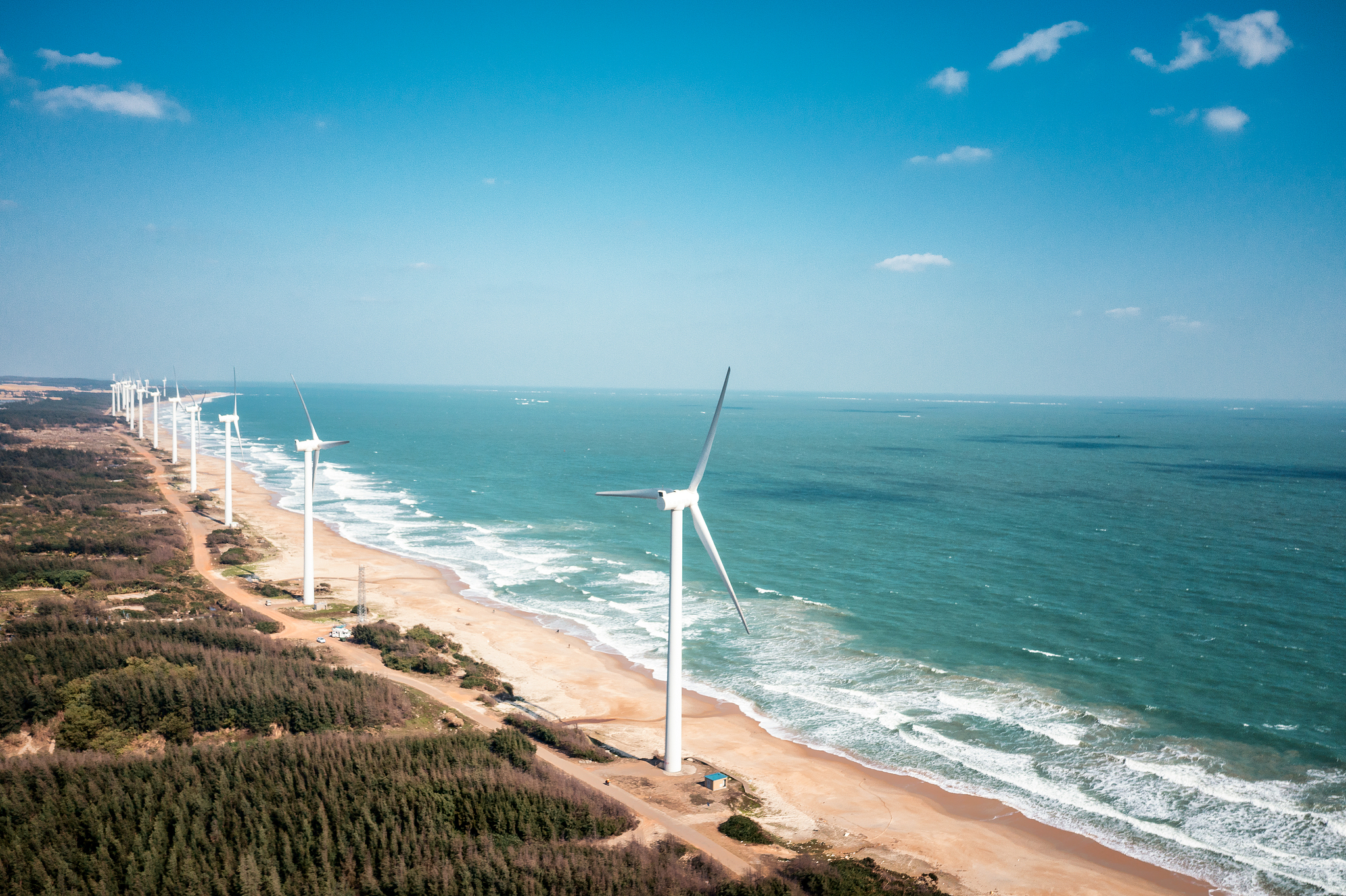 Wind turbines along the coast of Wenchang, Hainan Province, south China. /VCG