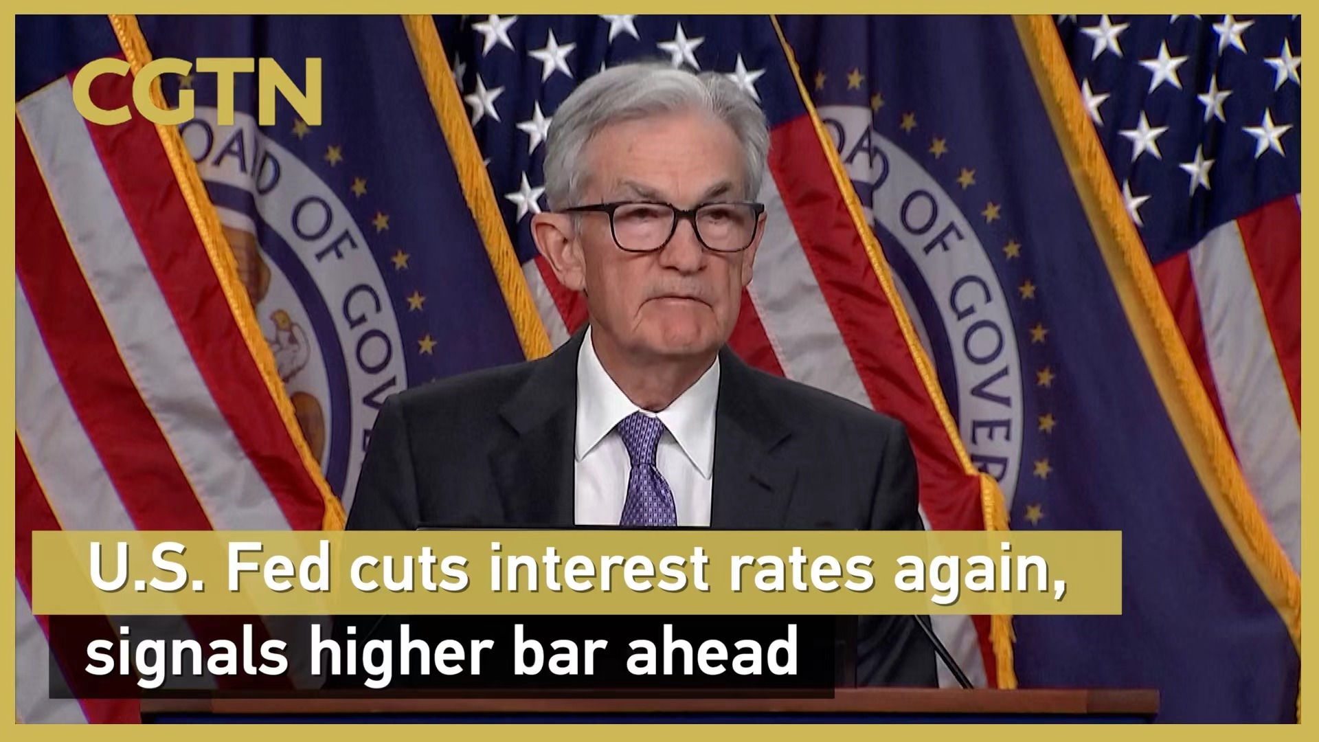 U.S. Fed cuts interest rates again, signals higher bar ahead