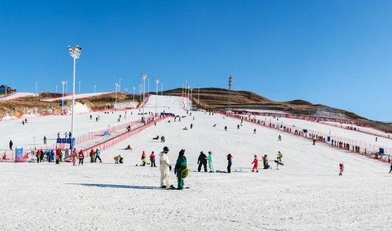 Visitors enjoy snow activities at the Mazongshan Ski Resort in Hohhot, Inner Mongolia on December 7, 2025. /IC