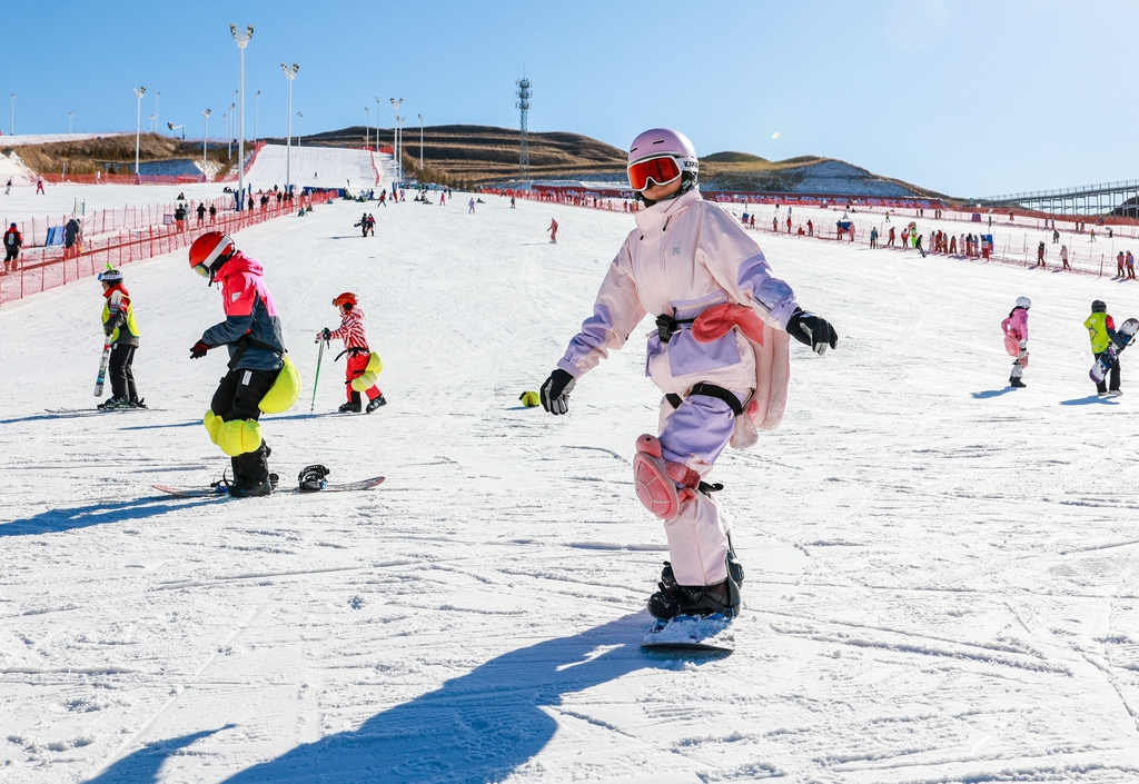 Visitors ski at the Mazongshan Ski Resort in Hohhot, Inner Mongolia on December 7, 2025. /IC
