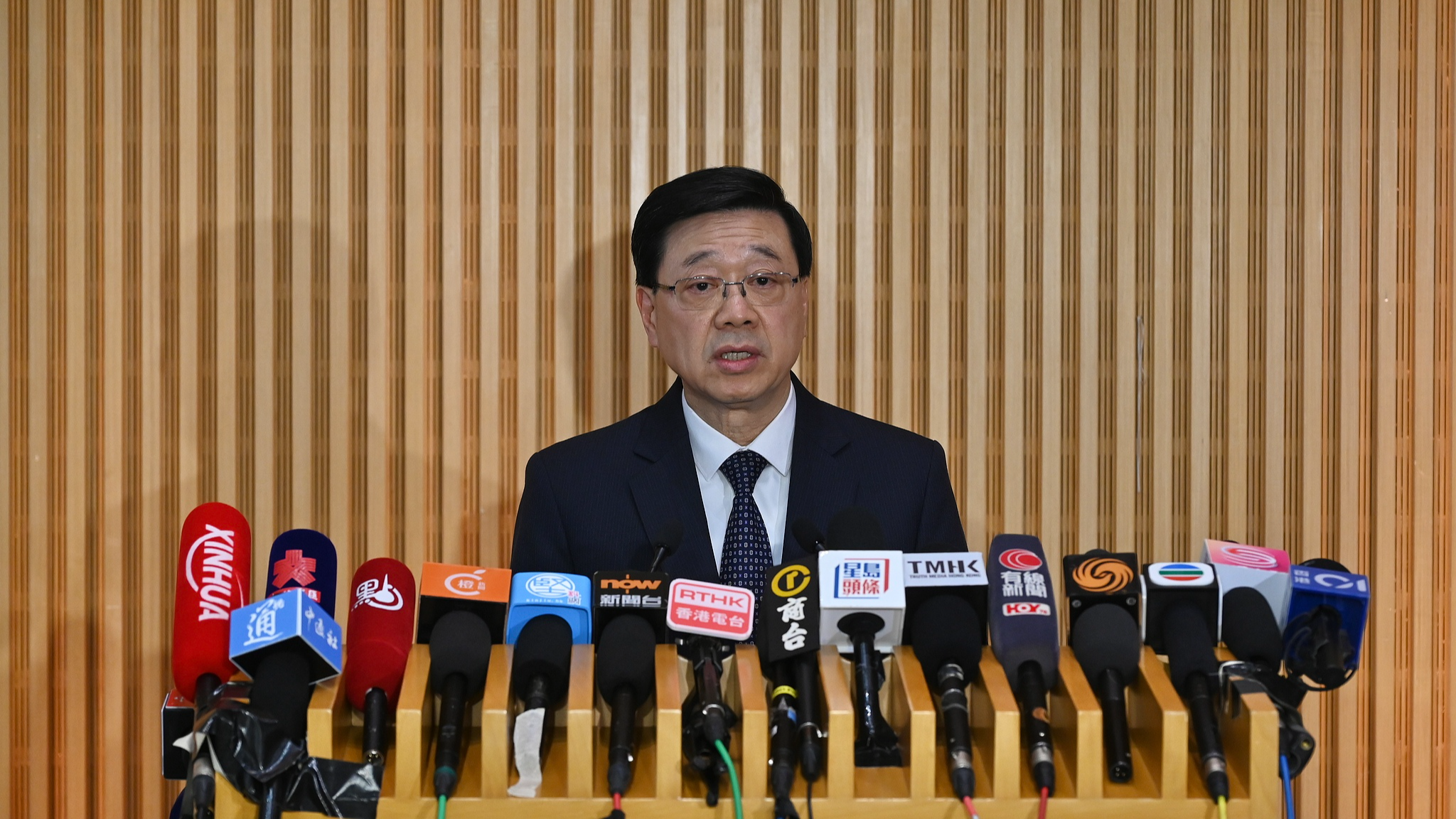 John Lee, chief executive of south China's Hong Kong Special Administrative Region, speaks at a press conference, December 12, 2025. /VCG