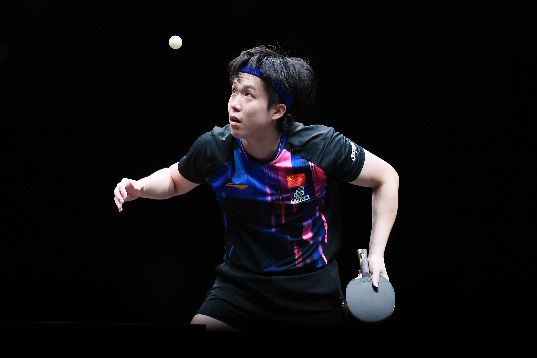 Wang Chuqin of China hits a shot in the men's singles quarterfinals against Alexis Lebrun of France at the World Table Tennis (WTT) Hong Kong Finals in the Hong Kong Special Administrative Region (SAR), December 12, 2025. /VCG