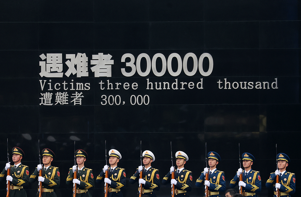 A flag-raising ceremony and a ceremony to lower China's national flag to half-mast are held at the Memorial Hall of the Victims in Nanjing Massacre by Japanese Invaders in Nanjing, capital of east China's Jiangsu Province, December 13, 2025. /VCG