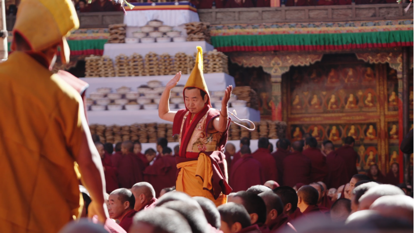 Monks engage in debate during the celebration at Tashilhunpo Monastery. In Tibetan Buddhism, debate is a unique approach to studying the scriptures. The debate begins with hand-clapping. Southwest China's Xizang Autonomous Region, December 9, 2025. /CGTN