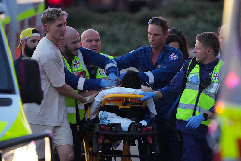 Emergency workers transport a person on a stretcher after a reported shooting at Bondi Beach, in Sydney, December 14, 2025. /VCG