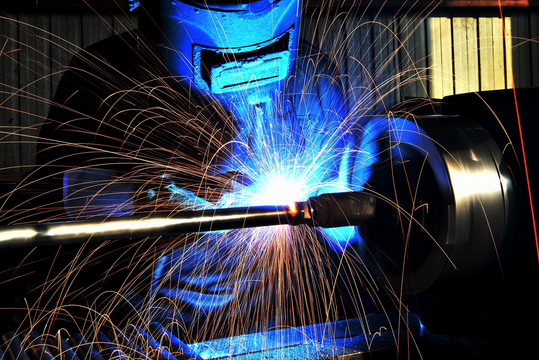 Workers welding in a production workshop in Shijiazhuang, Hebei Province on November 27, 2025. /VCG